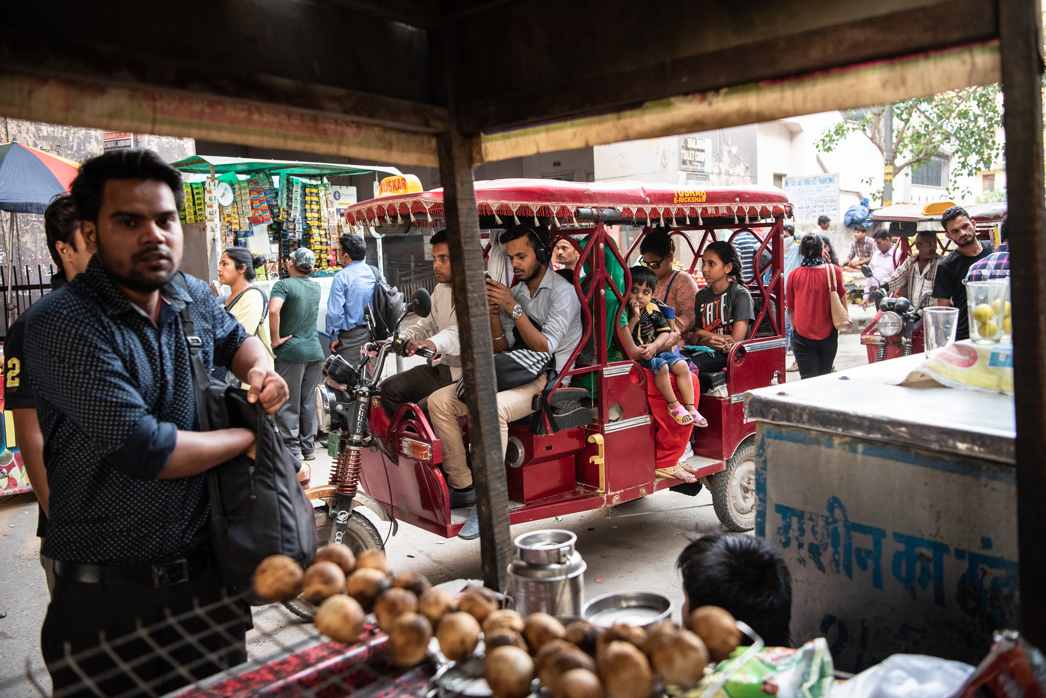 People ride an electric rickshaw in New Delhi, India, June 19, 2019. (Saumya Khandelwal/The New York Times)