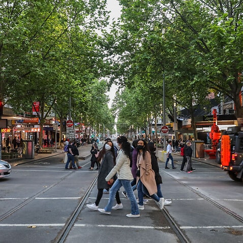 A general view of foot and car traffic on Swanston street on 29 October, 2021 in Melbourne. 