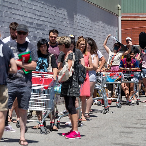 Long queues are seen outside Coles in Maylands, one of the potential exposure sites, in Perth, Sunday, 31 January, 2021. 